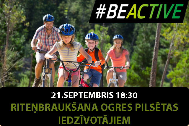 Family riding mountain bikes in forest